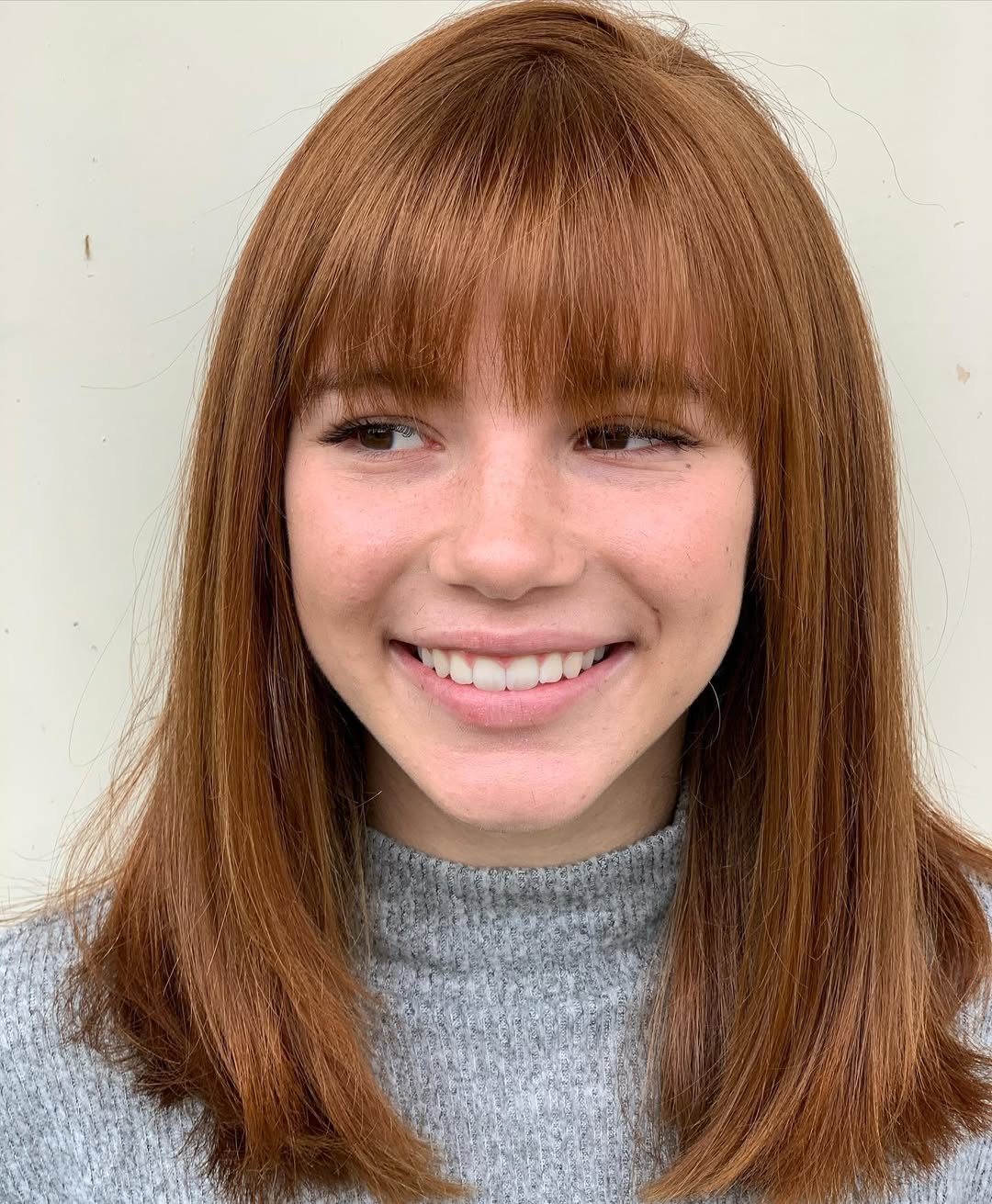 It’s hard to improve on this natural beauty...I mean...look at her! 🤩 However, those textured bangs and a nice clean trim take her to a different level! 
Swipe for before ->