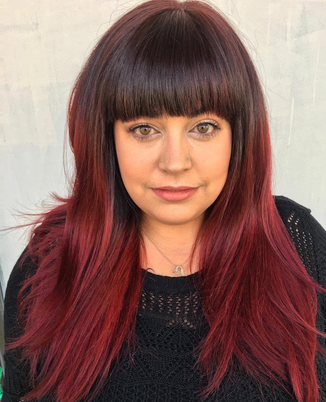 B A N G I N. ❤️
.
.
Using #joico color we glazed Leah’s hair with a delicious cocktail of violets and crimson reds. Finishing with a healthy trim, and a chop to create those thick blunt bangs...needless to say I’m in love!
